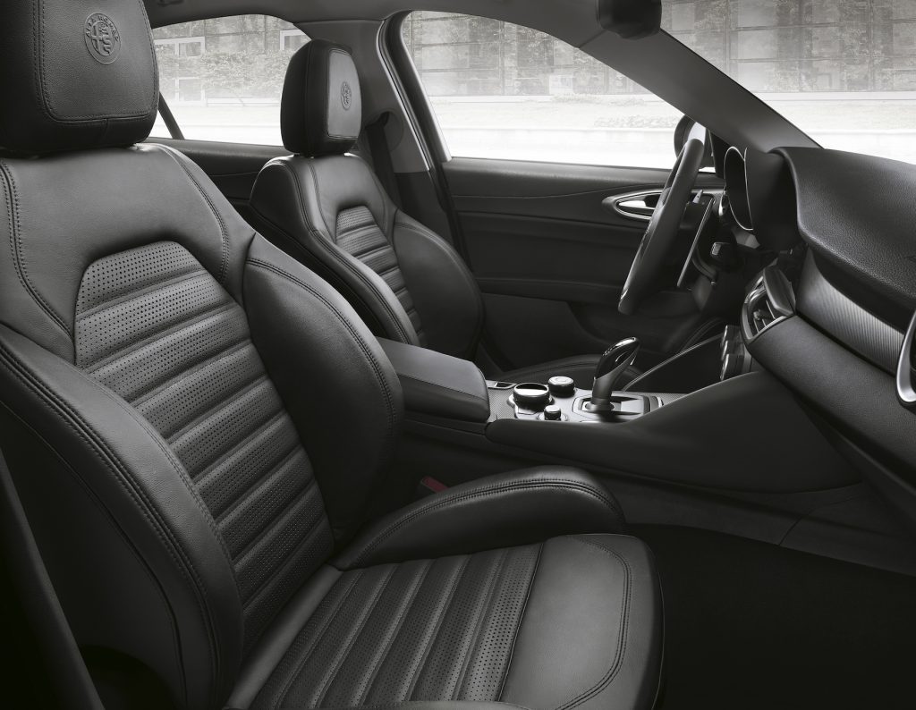 Blue Alfa Romeo Giulia Veloce interior with black leather seats