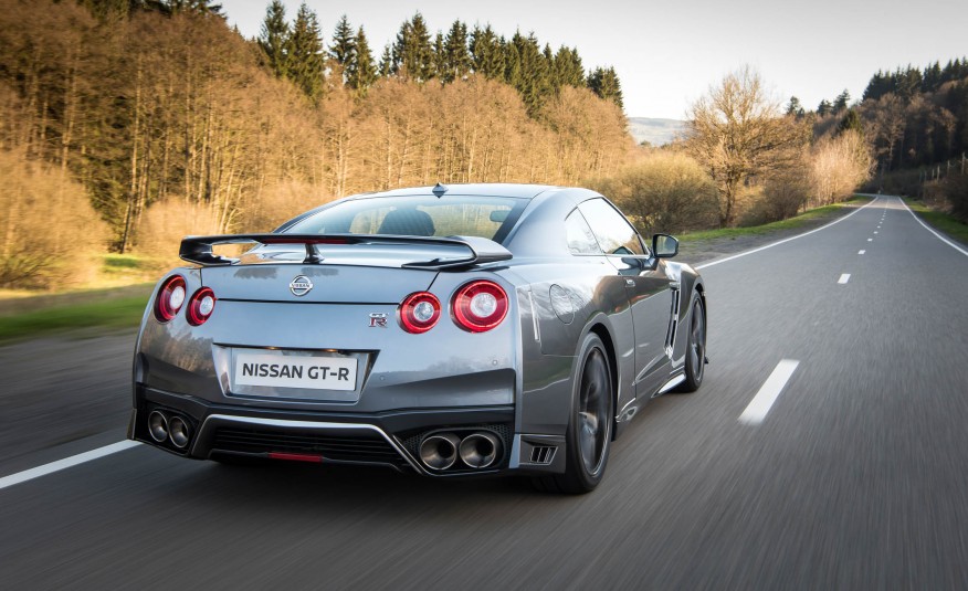 Grey 2017 Nissan GT-R driving on the open road