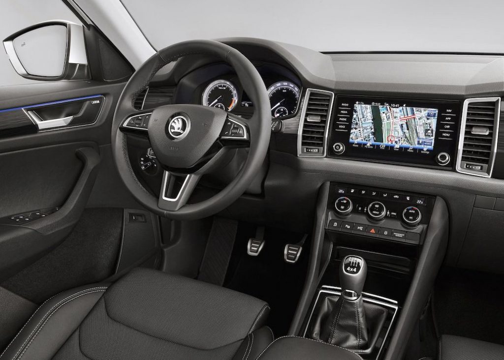 Skoda Kodiaq interior with manual transmission and large LCD display