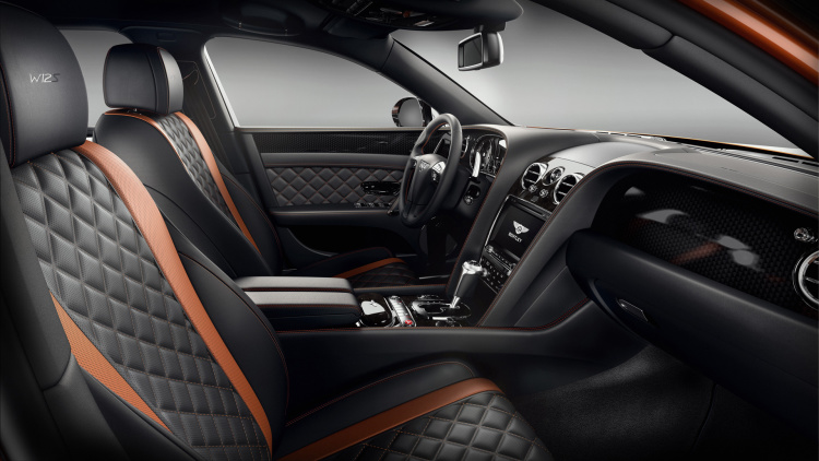 Bentley Flying Spur W12 S interior shows black leather seats with orange accents