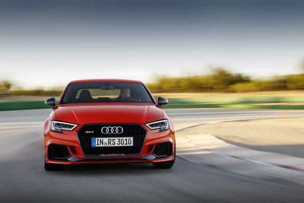 catalunya red Audi RS3 Sedan being driven on race track