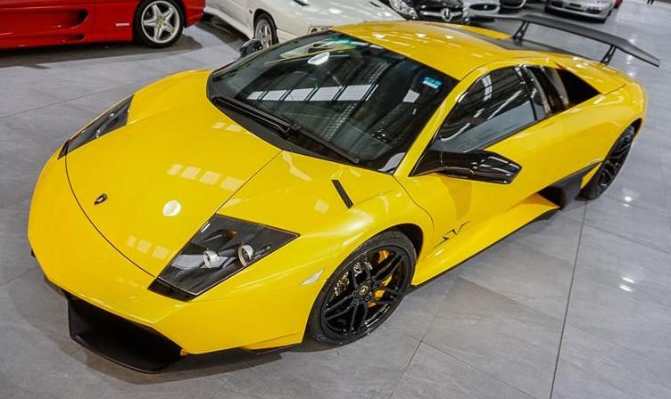 Left Side Profile of Yellow Lamborghini Murcielago 670-4 SV
